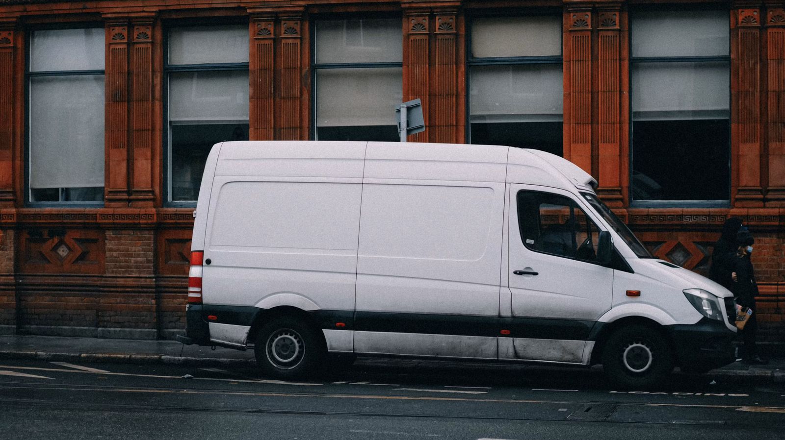 White delivery van on a city street, ready for an urgent consignment